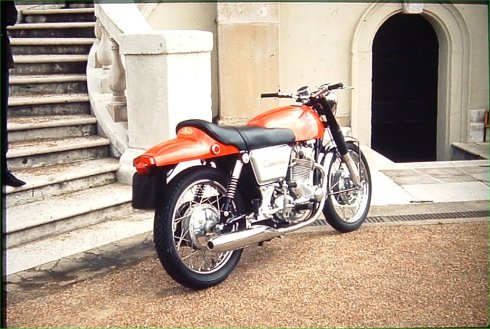 Commando bike by steps of museum pic
